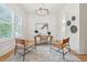 Bright office space with hardwood floors, modern lighting, and stylish decor creating an inviting workspace at 4333 Rickenbacker Ne Way, Atlanta, GA 30342