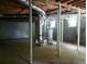 Unfinished basement with exposed ductwork, support beams and a window at 4643 Wesley Dr, Austell, GA 30106