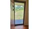 View of the house through a front door with a black metal door grill at 4643 Wesley Dr, Austell, GA 30106