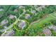 This is an aerial shot of the neighborhood, with the subject property circled in yellow and close to a golf course at 829 Big Horn Holw, Suwanee, GA 30024
