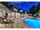 Enjoy the evening in the spacious backyard with pool and plenty of seating, perfect for relaxation at 829 Big Horn Holw, Suwanee, GA 30024