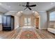 Bright bonus room featuring hardwood floors, a seating area, and natural light at 829 Big Horn Holw, Suwanee, GA 30024