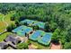Community tennis courts offer a great amenity with multiple well maintained tennis courts and a clubhouse at 829 Big Horn Holw, Suwanee, GA 30024