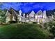 Stunning home with a manicured lawn, beautiful stone accents, and an inviting facade at 829 Big Horn Holw, Suwanee, GA 30024
