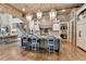 Beautiful kitchen featuring a large island with seating, custom cabinetry, and high-end appliances at 829 Big Horn Holw, Suwanee, GA 30024