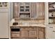Detailed view of kitchen cabinetry with stainless steel appliances and granite countertops at 829 Big Horn Holw, Suwanee, GA 30024