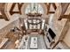 Open-concept living room with high ceilings and stone fireplace at 829 Big Horn Holw, Suwanee, GA 30024