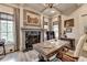 Office features custom built-ins, a fireplace, and natural light at 829 Big Horn Holw, Suwanee, GA 30024