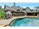 Lovely backyard pool with ample patio space for relaxing and entertaining at 829 Big Horn Holw, Suwanee, GA 30024