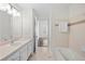 Bathroom featuring a bathtub, updated vanity, and tile floors at 1101 Juniper Ne St # 1504, Atlanta, GA 30309