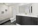 Modern bathroom featuring a glass-enclosed shower and double vanity at 1101 Juniper Ne St # 1504, Atlanta, GA 30309