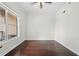 Bright bedroom featuring hardwood floors and a large window at 1101 Juniper Ne St # 1504, Atlanta, GA 30309