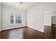 Bedroom with hardwood floors and views through a window at 1101 Juniper Ne St # 1504, Atlanta, GA 30309