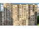 Stately high-rise building featuring multiple balconies, classic architecture, and an abundance of windows at 1101 Juniper Ne St # 1504, Atlanta, GA 30309