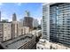Urban view showcasing the cityscape with buildings and a crane under a sunny sky at 1101 Juniper Ne St # 1504, Atlanta, GA 30309