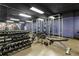Gym with weight training equipment, including dumbbells, weight racks, and benches on top of rubber flooring at 1101 Juniper Ne St # 1504, Atlanta, GA 30309