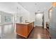 Open floorplan with kitchen island, laundry closet and living space in a modern home at 1101 Juniper Ne St # 1504, Atlanta, GA 30309