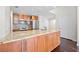 Well-designed kitchen with granite counters, hardwood cabinets and stainless appliances at 1101 Juniper Ne St # 1504, Atlanta, GA 30309