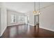 Spacious, sunlit living area featuring hardwood flooring and modern architectural details at 1101 Juniper Ne St # 1504, Atlanta, GA 30309