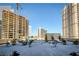 Wide rooftop deck with potted plants and lounge seating, perfect for enjoying city views and outdoor relaxation at 1101 Juniper Ne St # 1504, Atlanta, GA 30309