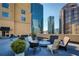 Stunning rooftop deck with city views, comfortable seating, and lush greenery for relaxing and entertaining at 1101 Juniper Ne St # 1504, Atlanta, GA 30309