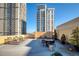Stunning rooftop deck with lounge chairs and city views offers a relaxing outdoor space at 1101 Juniper Ne St # 1504, Atlanta, GA 30309