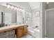 Well-lit bathroom with large tub and walk-in shower at 1644 Cutters Mill Dr, Lithonia, GA 30058