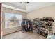 Walk-in closet equipped with shelves, clothing racks, and natural lighting at 1644 Cutters Mill Dr, Lithonia, GA 30058