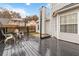 Outdoor deck space with a table and chairs, perfect for relaxing or entertaining at 1644 Cutters Mill Dr, Lithonia, GA 30058