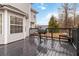 Outdoor deck space featuring a grill and a bench, perfect for outdoor cookouts at 1644 Cutters Mill Dr, Lithonia, GA 30058