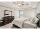 Spacious main bedroom with tray ceiling and neutral colors at 1644 Cutters Mill Dr, Lithonia, GA 30058