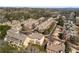 Community aerial view showcasing well-maintained townhomes with beautiful landscaping and mature trees in a desirable neighborhood at 2009 Kensington Green Se Dr, Smyrna, GA 30080