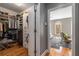 Walk-in closet with custom shelving, hanging rods, and drawers providing ample storage space for clothes and accessories at 2009 Kensington Green Se Dr, Smyrna, GA 30080