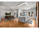 Open concept kitchen with island and dining area, showcasing contemporary design and finishes at 2009 Kensington Green Se Dr, Smyrna, GA 30080