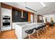Contemporary kitchen with a large island, modern appliances, and stylish pendant lighting at 2009 Kensington Green Se Dr, Smyrna, GA 30080