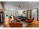 Bright living room with hardwood floors, modern lighting, stylish furniture, and beautiful decor at 2009 Kensington Green Se Dr, Smyrna, GA 30080
