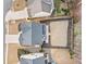 Aerial view of a property showing the backyard, covered patio, and surrounding neighborhood at 3810 Branch Bluff Ln, Cumming, GA 30040