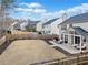 The spacious backyard is fenced in and ready for new landscaping and outdoor activities at 3810 Branch Bluff Ln, Cumming, GA 30040