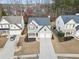 Charming two-story home with a well-kept lawn and a two-car garage, perfect for a Gathering at 3810 Branch Bluff Ln, Cumming, GA 30040