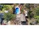 Aerial view of a home with a lovely backyard featuring a pool at 4570 Nantucket Sw Dr, Lilburn, GA 30047