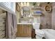 Updated bathroom featuring a modern vanity, stylish fixtures, and decorative accents at 4570 Nantucket Sw Dr, Lilburn, GA 30047