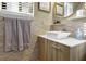 Updated bathroom featuring a modern vanity, stylish fixtures, and decorative accents at 4570 Nantucket Sw Dr, Lilburn, GA 30047