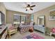 Bright bedroom with a large window, cute decor and cozy ambiance at 4570 Nantucket Sw Dr, Lilburn, GA 30047