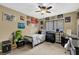 Cozy bedroom with a comfortable bed and stylish black furniture at 4570 Nantucket Sw Dr, Lilburn, GA 30047