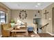 Charming breakfast nook with built-in bench seating and views of the stairs to the basement at 4570 Nantucket Sw Dr, Lilburn, GA 30047