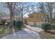 This property features a two-car garage and a long driveway for easy parking at 4570 Nantucket Sw Dr, Lilburn, GA 30047
