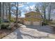 This home's exterior is a blend of modern design with a natural landscape setting at 4570 Nantucket Sw Dr, Lilburn, GA 30047