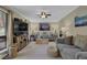 Comfortable living room with a large window, TV, and modern décor at 4570 Nantucket Sw Dr, Lilburn, GA 30047