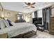 This main bedroom offers cozy carpet and a ceiling fan at 4570 Nantucket Sw Dr, Lilburn, GA 30047