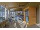 Bright screened-in porch with seating, sauna and hot tub, perfect for relaxation and enjoying the outdoors at 4570 Nantucket Sw Dr, Lilburn, GA 30047